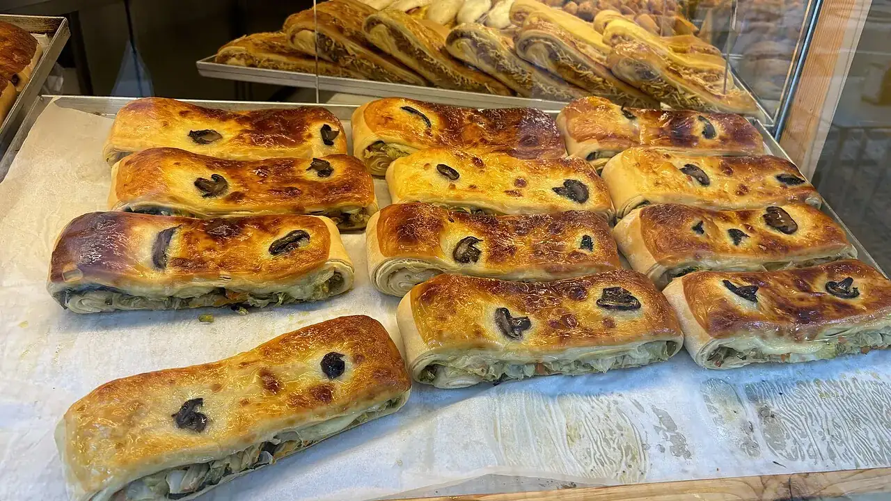 Filled pastries on a tray